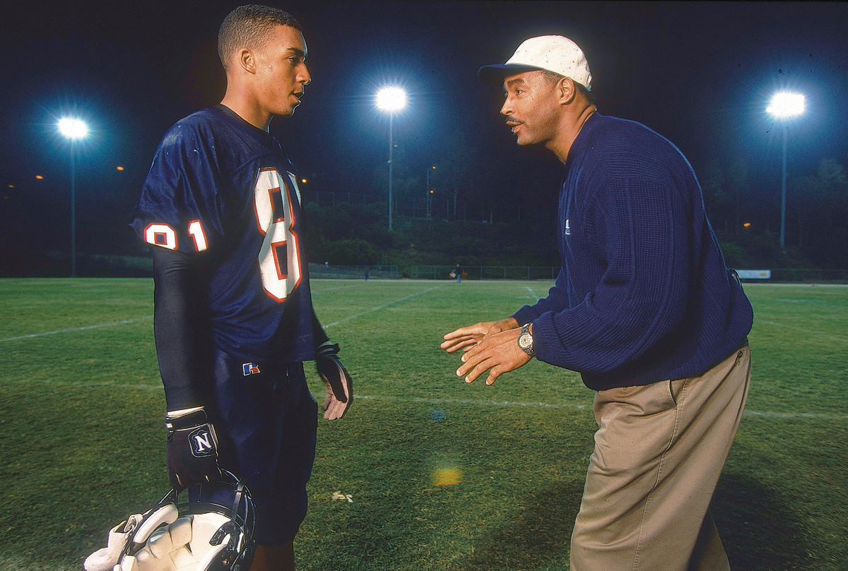 Father and son, in 1999, when Junior was in high school.